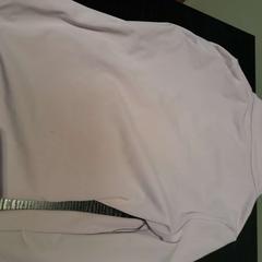 Kinderjas rose, zoals gemeld door TCL met iLost