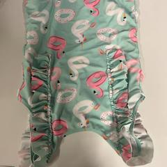 Fürdőruha, amint azt Silver Sands Beach az iLost segítségével jelentette.