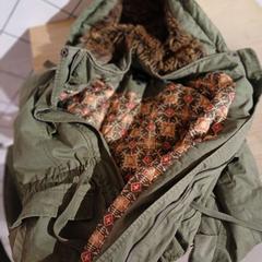 Jacket Green with fur, as reported by Conscious Hotel Westerpark using iLost