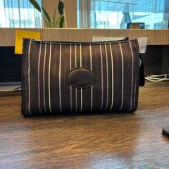 Borsa da toilette, come riportato da WestCord Hotel Eindhoven utilizzando iLost