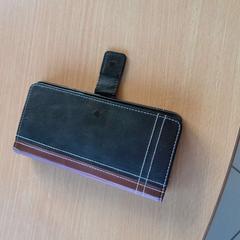 Telephone NOIR AVEC PROTECTION NOIRE ET MARRON, zoals gemeld door TCL met iLost