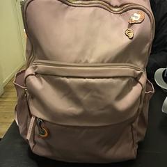 Mochila, como reportado por Qbuzz U-OV utilizando o iLost