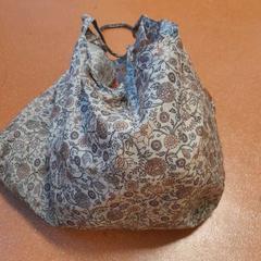 İLost kullanarak TCL tarafından bildirildiği gibi Çanta à fleurs