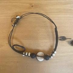 Black Corded Bracelet with White Beads and Stones, zoals gemeld door Best Kept Secret 2025 met iLost