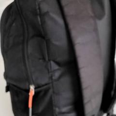 Ryggsäck Zwart met oranje, rapporterat av Regio Antwerpen - Brussel med iLost