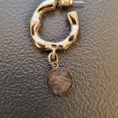 Zilveren oorring met hanger (oorbel) a été signalé sur iLost