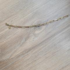 Gouden armband klavertje vier, som rapportert til iLost