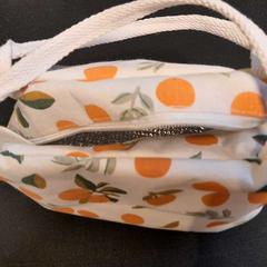 Cool bag blanc et orange, as reported by TCL using iLost