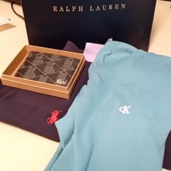 Brieftasche & Hemd shirt, gemeldet von Mövenpick Hotel Amsterdam City Centre über iLost