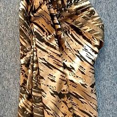 Scarf Bruin goud, zoals gemeld door EBS OV Poeldijk met iLost