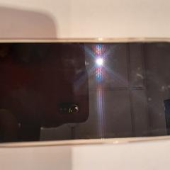 Mobile phone blanc iPhone, as reported by TCL using iLost