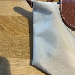 حقيبة يد handtasje longchamp، كما تم الإبلاغ عنه بواسطة Designer Outlet Roermond عبر iLost