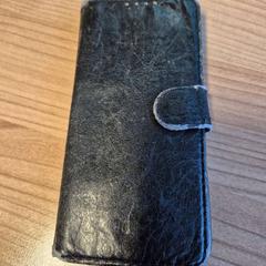 Smartphone zwart/grijs met hoesje Motorola, as reported by Connexxion Zeeland using iLost