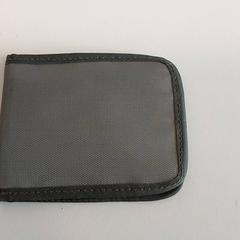 Portefeuille - Tigana, a été signalé par Centraal magazijn utilisant iLost