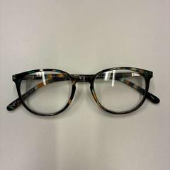 Óculos bruin met oranje en blauw, como reportado por Universiteitsbibliotheek Universiteitskwartier utilizando o iLost