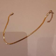 Collana gouden kleur, come riportato da Van der Valk Hotel Schiphol utilizzando iLost