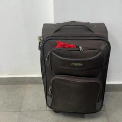 Wheeled suitcase بني, as reported by محطة بريدة (بريدة) using iLost