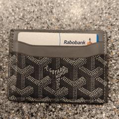 Grijze portemonnee, iLost에 보고됨