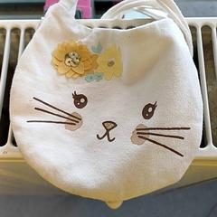 Saco de criança Beige, motif chat, como reportado por IKEA Strasbourg utilizando o iLost