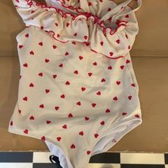 Fürdőruha, amint azt Familie Resort Molenwaard az iLost segítségével jelentette.