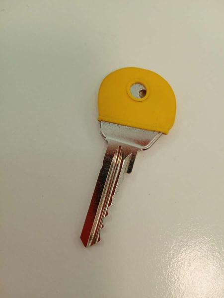 Key sleutel met geel rubber