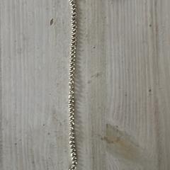 Armband goudkleurig (verguld zilver) met hartje, segons s'ha informat a iLost