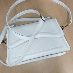 Saco - handtas, como reportado por Centraal magazijn utilizando o iLost