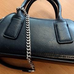 Purse, come riportato da Inntel Hotels Amsterdam Centre utilizzando iLost