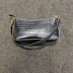 Handtasje, zoals gemeld door Arriva Infoshop Enschede met iLost