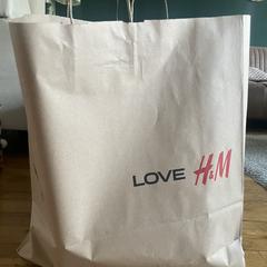 Tas met kleding H&M, come riportato a iLost