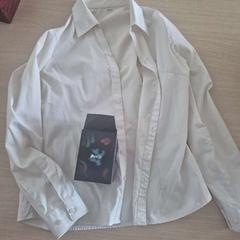 Camisas, ha sido reportado por Amsterdam ID Aparthotel con iLost