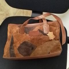 Prenosná taška à main, ako bolo nahlásené ilévia pomocou iLost