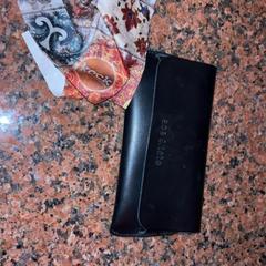 Estuche de anteojos brillenkoker geen bril, brillendoekje, ha sido reportado por Pathé Nijmegen con iLost