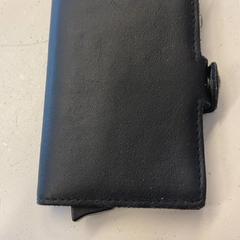 Brieftasche Arabbaj, gemeldet von HTM über iLost