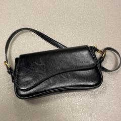 Poltsa Zwart, gisa salatu by Pathé Ypenburg iLost erabiliz