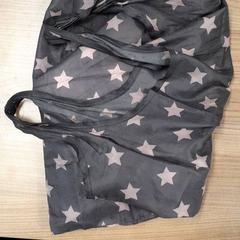 Kézitáska Bruin met sterren, amint azt Transdev Hoeksche Waard Goeree Overflakkee az iLost segítségével jelentette.