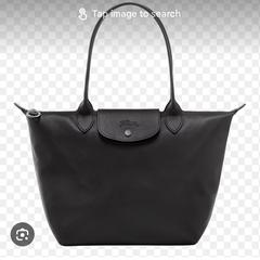 Zwarte long champ tas met inhoud، كما تم الإبلاغ عنه عبر iLost