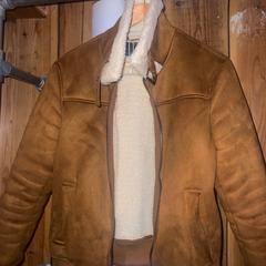 Coat, as reported by Club Nyx/Exit Café using iLost