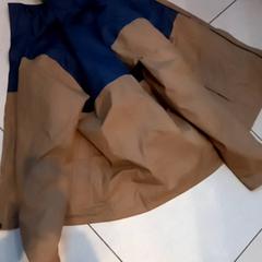 Impermeabile Blue and brown, come riportato da Leonardo Royal Hotel Amsterdam utilizzando iLost