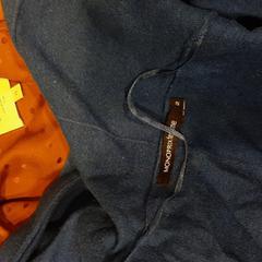 1 Blouse + 1 Blue Cardigan, ha sido reportado por MEININGER Hotel Brussels City Center con iLost