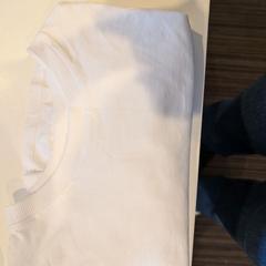 Maglietta, come riportato da Inntel Hotels Utrecht Centre utilizzando iLost