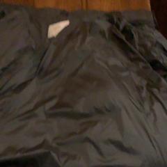 Giacca Zwart, come riportato da Café Leentje utilizzando iLost