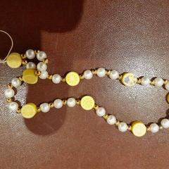 Náramek jaune et blanc, jak nahlášeno TCL pomocí iLost