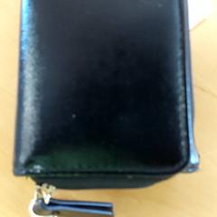 Plånbok - Raheq, rapporterat av Centraal magazijn med iLost