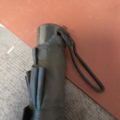 Opvouwbare paraplu noir, zoals gemeld door TCL met iLost