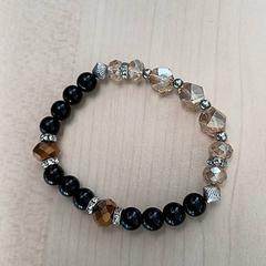 Bransoletka à perles marrons et noires, zgłoszono przez IKEA Rennes - Pacé przy użyciu iLost