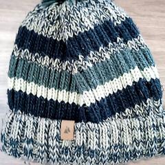 Gorro Laine vert et beige, segons ha informat CARS HANGARD mitjançant iLost