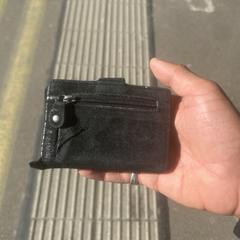 Zwarte portemonnee, ha sido reportado a iLost