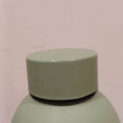 Bottiglia verde, come riportato da RÍO Shopping - Valladolid utilizzando iLost