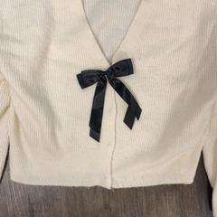 Maglione, come riportato da Inntel Hotels Amsterdam Centre utilizzando iLost